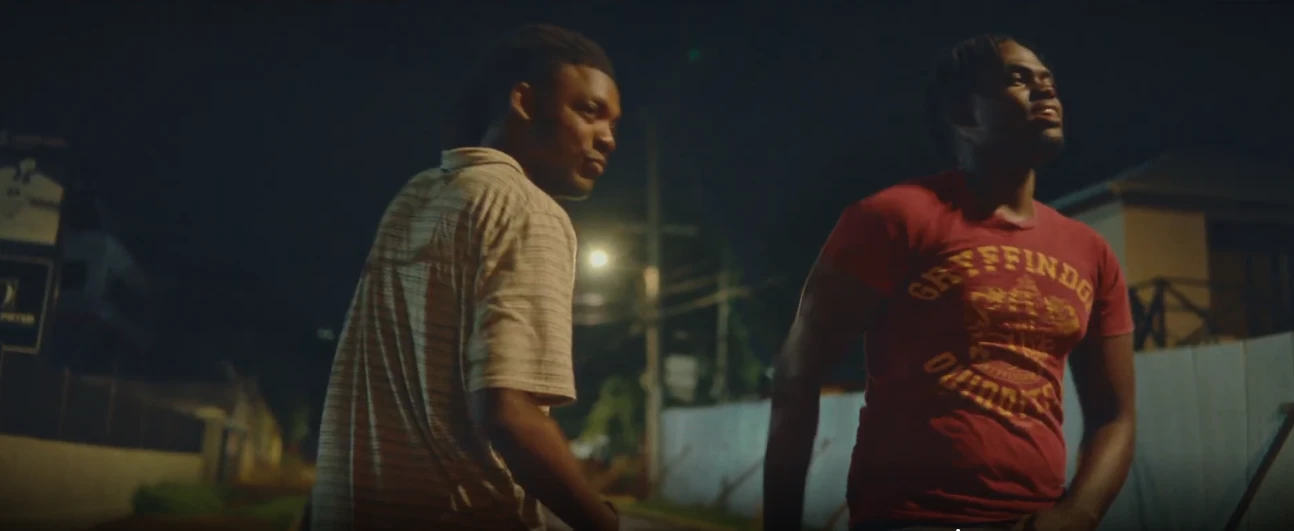 Two young men on a street at night in LICK, a poetic documentary by George Malcolm Walker
